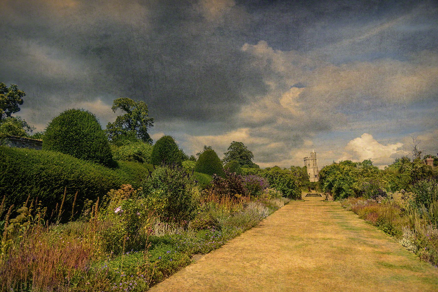 Goodnestone garden with the church of the Holy Cross in the background